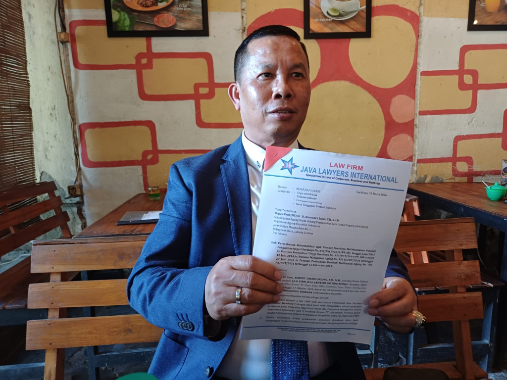 Kuasa hukum PT Unicomindo Perdana, Robert Simangunsong