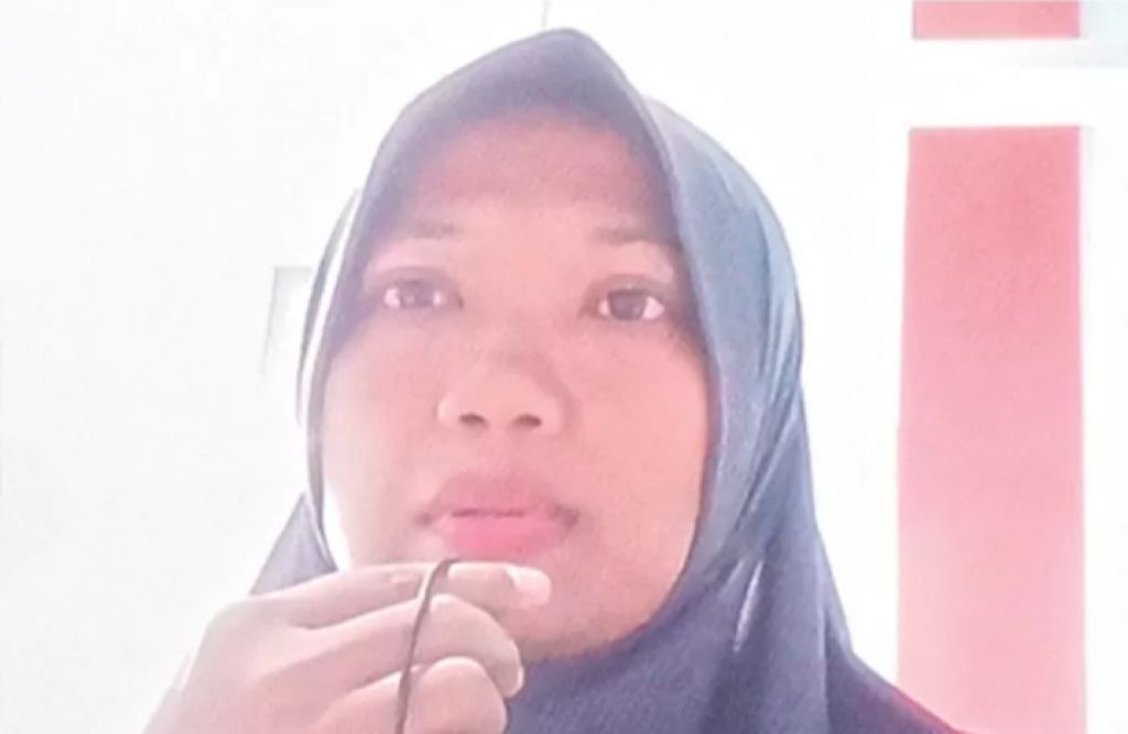 Anik Purwati Saat menyimak Penjelasan Jaksa di PN Surabaya